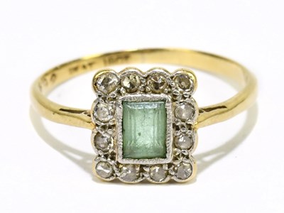 Lot 1143 - An 18ct yellow gold emerald and diamond Art...