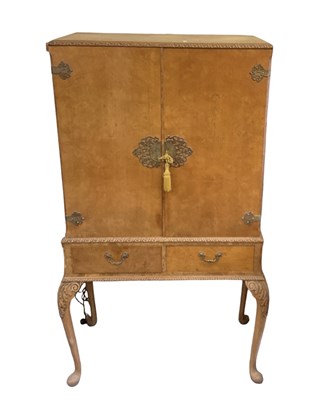 Lot 70 - An early 20th century burr walnut cocktail...