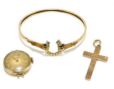 Lot 1272 - A 9ct yellow gold and seed pearl horseshoe set...