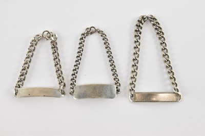 Lot 1357 - Three 925 hallmarked silver identity bracelets,...