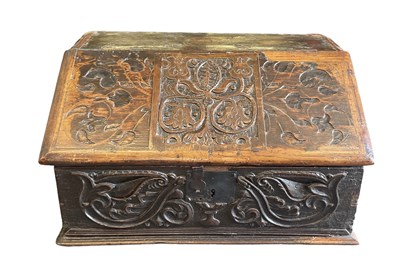 Lot 4 - An 18th century carved oak Bible box, with...