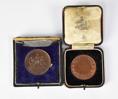 Lot 373 - Two school bronze sports medals for hurdles,...