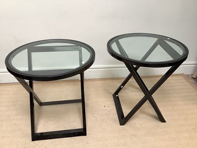 Lot 1238 - A pair of black lacquered circular glass top...