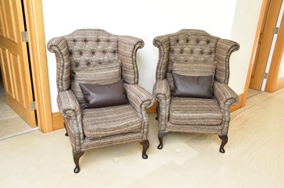 Lot 1237 - A pair of modern brown fabric Chesterfield...