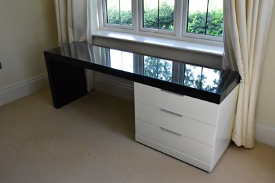 Lot 1234 - A contemporary black and white lacquered...