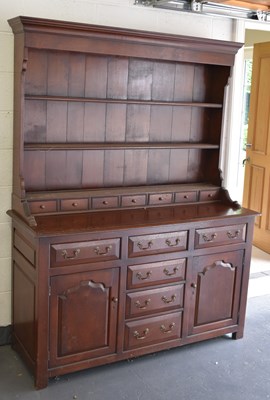 Lot 57A - A reproduction oak dresser with boarded plate...