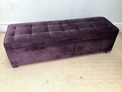Lot 1247 - A modern purple upholstered ottoman of...