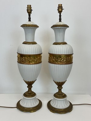 Lot 723 - A pair of decorative Continental porcelain and...