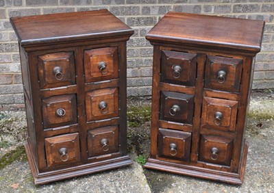 Lot 100 - A pair of modern hardwood six drawer chests,...