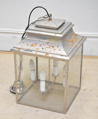 Lot 1532 - A modern chrome hanging lantern of square form...