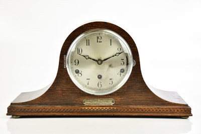 Lot 704 - An oak cased Napoleon hat mantel clock with...