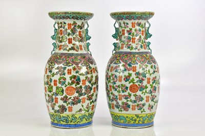 Lot 881 - A pair of modern Chinese Famille Rose vases...