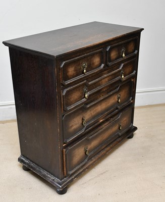 Lot 238 - An early 20th century oak chest of two over...