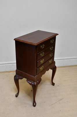 Lot 83 - A reproduction mahogany four drawer chest of...