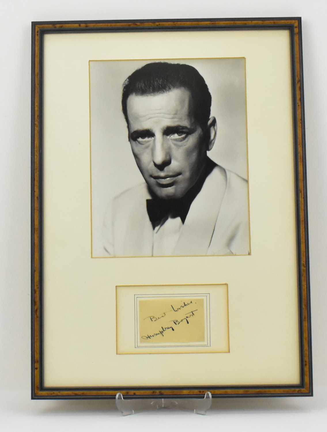 Lot 1630 - HUMPHREY BOGART; a mounted display featuring a...