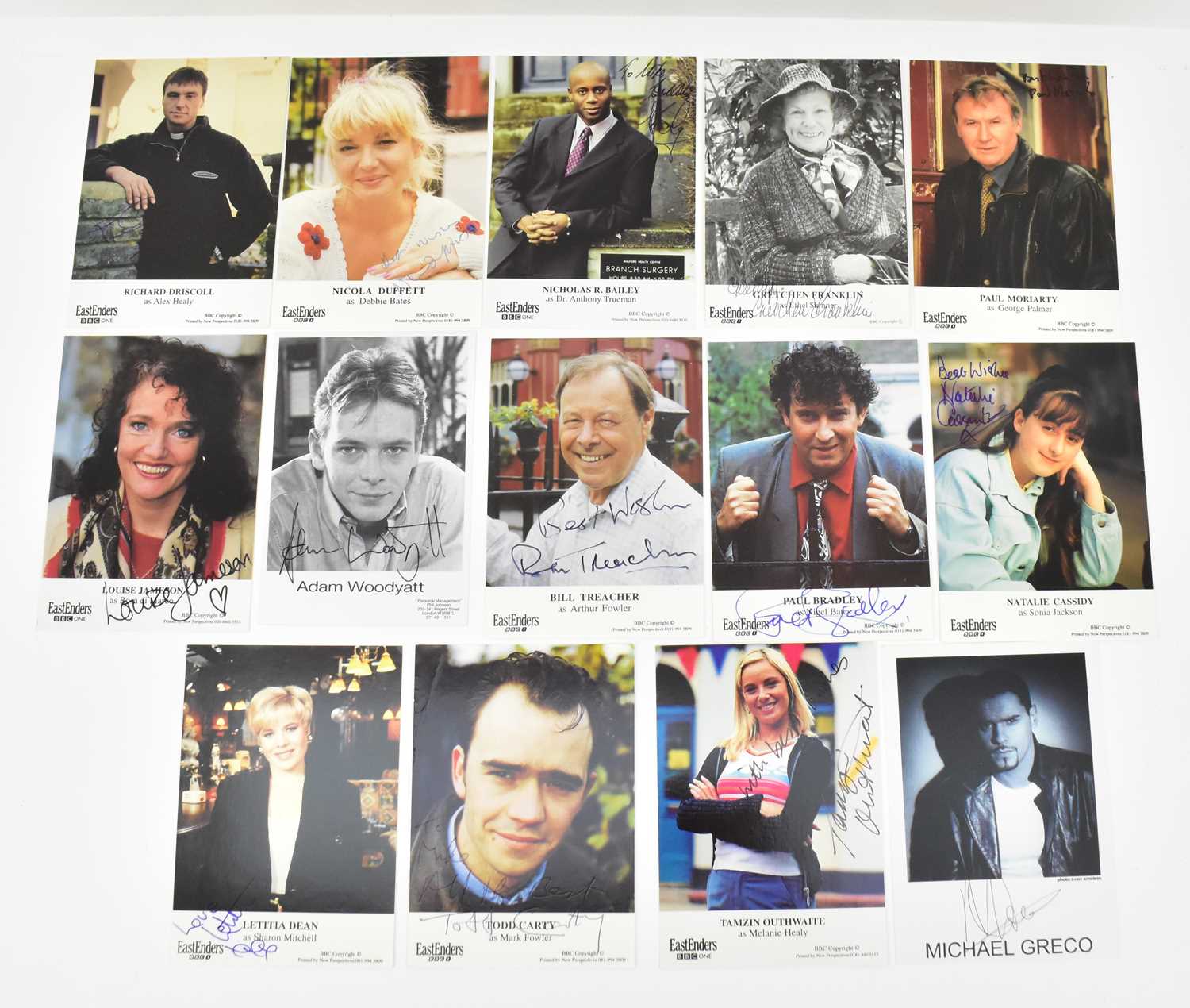 Lot 1694 - EASTENDERS; fourteen circa 1990s signed...