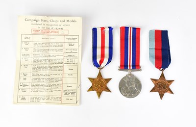 Lot 423 - A WWII trio of medals, comprising 1939-45 Star,...