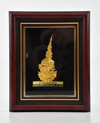 Lot 1155 - A framed yellow metal Thai bust of 'Totsakan'...