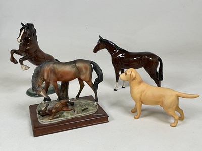 Lot 251 - BESWICK & ROYAL DOULTON; animal figures...