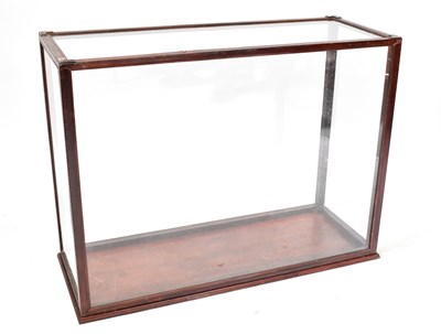 Lot 50 - A large wood and glass display case with...