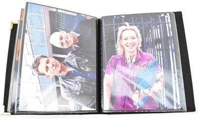 Lot 1667 - CORONATION STREET; a small full album...