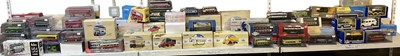 Lot 571 - CORGI; a large quantity of boxed model diecast...