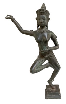 Lot 1074 - An Indian bronze figure of a dancing lady,...