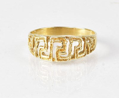 Lot 607 - A 14ct yellow gold ring with Greek Key...