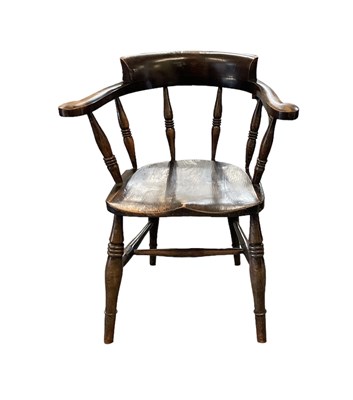 Lot 96 - A smoker's bow back elbow chair.