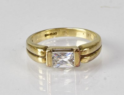 Lot 616 - A 9ct yellow gold ring set with rectangular...