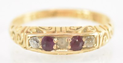 Lot 1291 - An 18ct yellow gold ruby and diamond set ring,...