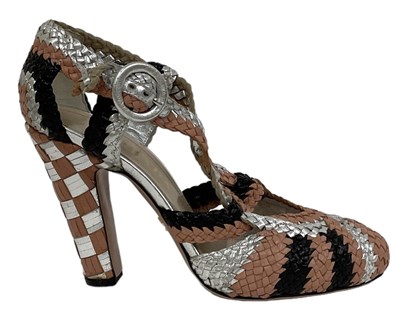 Lot 551 - PRADA; a pair of brown, silver and black...