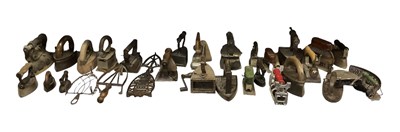 Lot 349 - A collection of irons and stands including an...