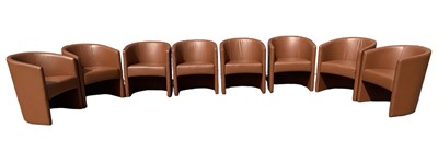 Lot 39 - A set of eight brown leather upholstered tub...