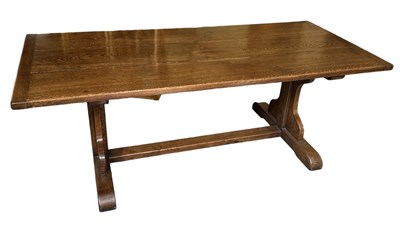 Lot 15 - A reproduction oak refectory type table, 205 x...