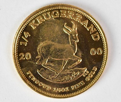 Lot 581 - A 2000 1/4oz gold Krugerrand, cased, with...