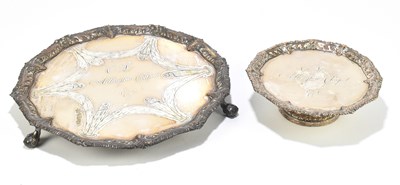 Lot 1036 - An old Sheffield plate salver with cast scrolling border and central inscription