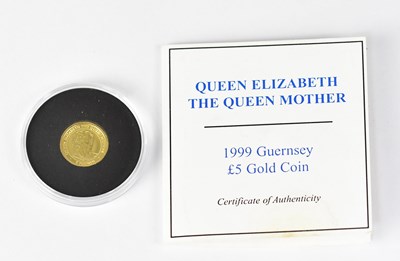 Lot 587 - ROYAL MINT; a 1999 1/25oz Guernsey £5 gold...