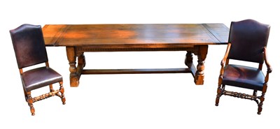 Lot 26 - A good quality reproduction oak draw-leaf...