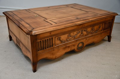 Lot 44 - A modern rectangular coffee table with pull-up...