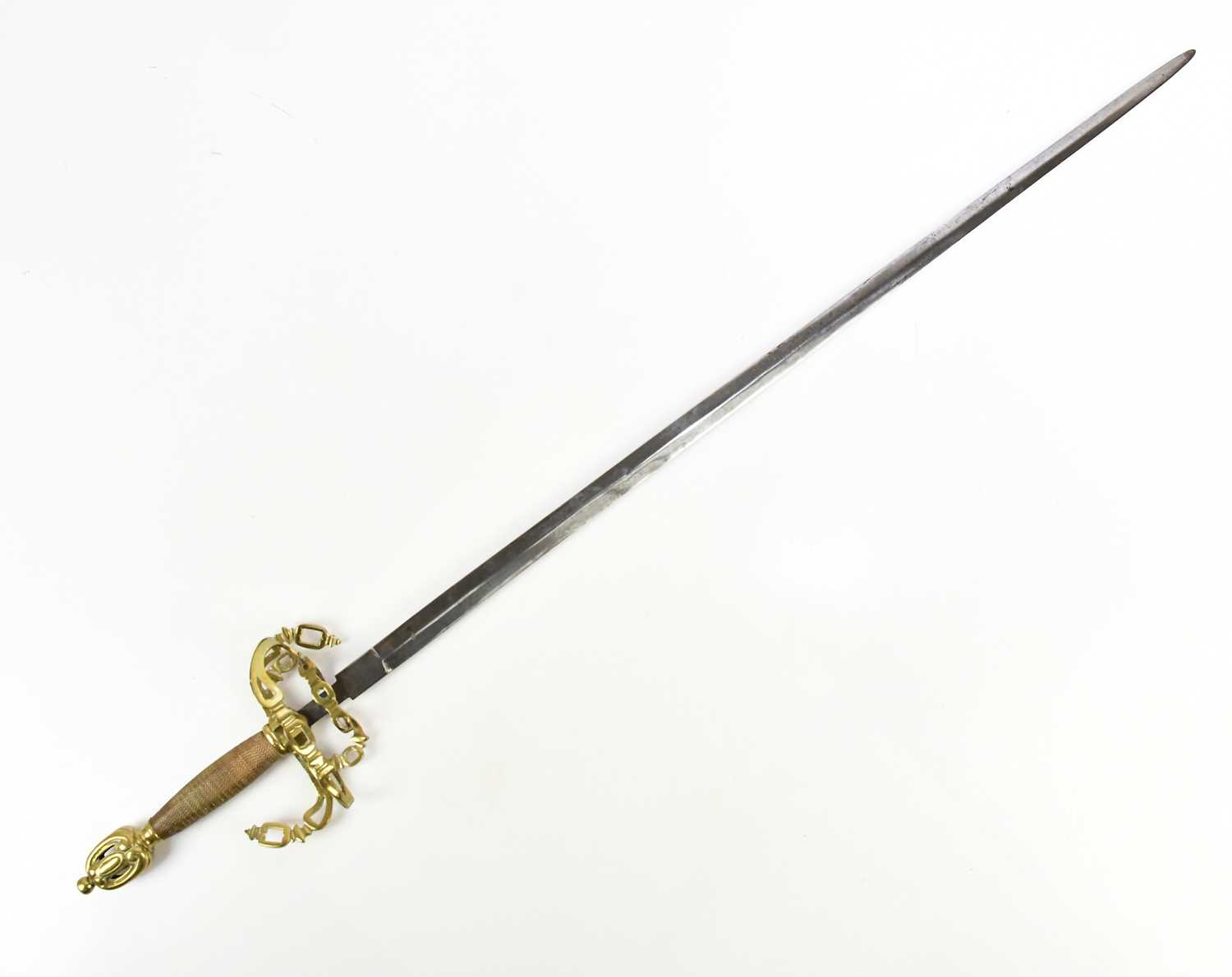 Lot 1384 - A modern decorative dress sword, with scroll...