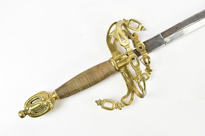 Lot 1384 - A modern decorative dress sword, with scroll...