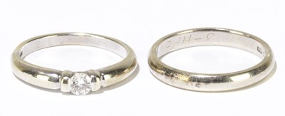 Lot 1110 - An 18ct white gold and diamond solitaire ring...