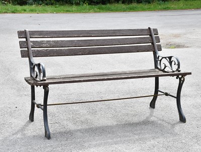 Lot 280 - A modern cast metal and wood garden bench,...