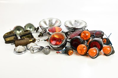 Lot 1002 - A collection of car lights including brake...