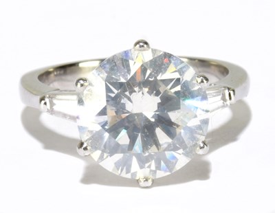 Lot 1001 - A platinum and diamond solitaire ring, the six...