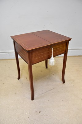 Lot 119 - An Edwardian inlaid mahogany pop-up writing...