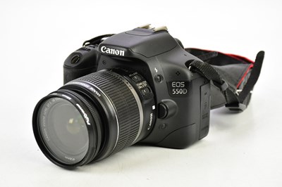 Lot 1180 - CANON; a Canon EOS 550D DSLR camera, with a...