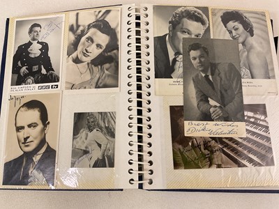 Lot 1637 - A blue album containing the autographs of TV...