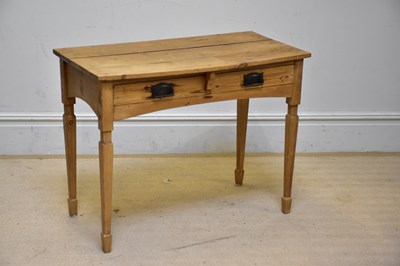 Lot 153 - An Edwardian pine side table, with bowfront...